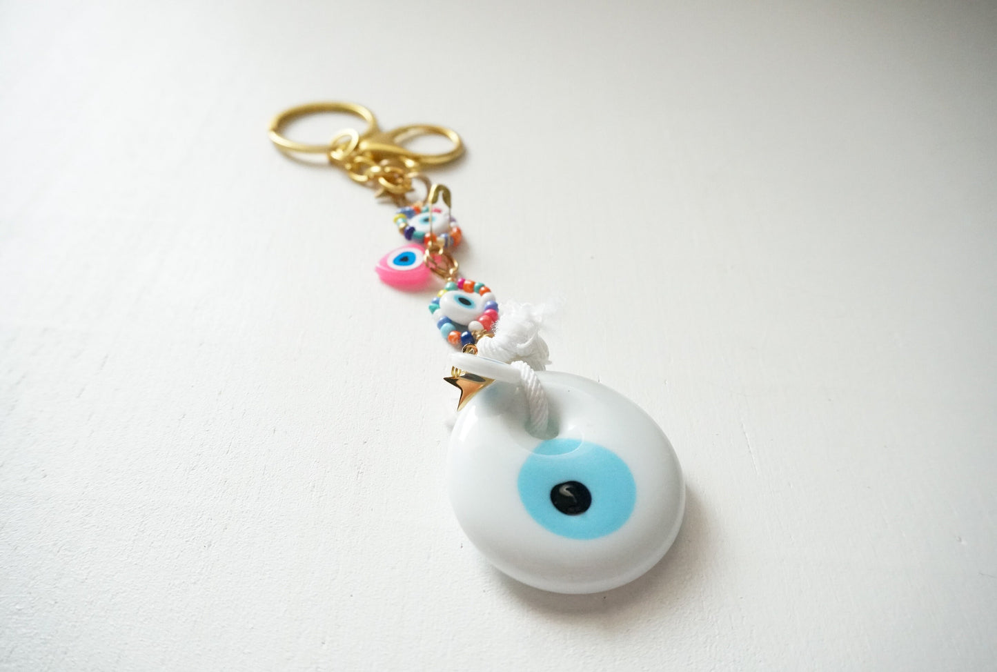 Portafortuna - Evil Eye Keychain in White by ConAmore Gems